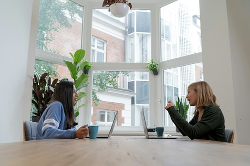 2 product managers in a meeting